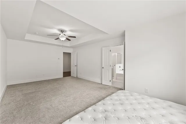 a view of a big room with closet and fan