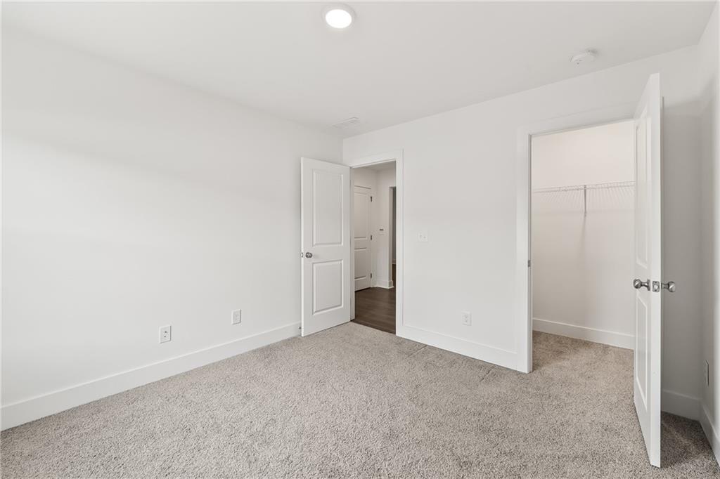 98 Auburn Valley Way Auburn, GA 30011 - Photo 31 of 47 a view of an empty room