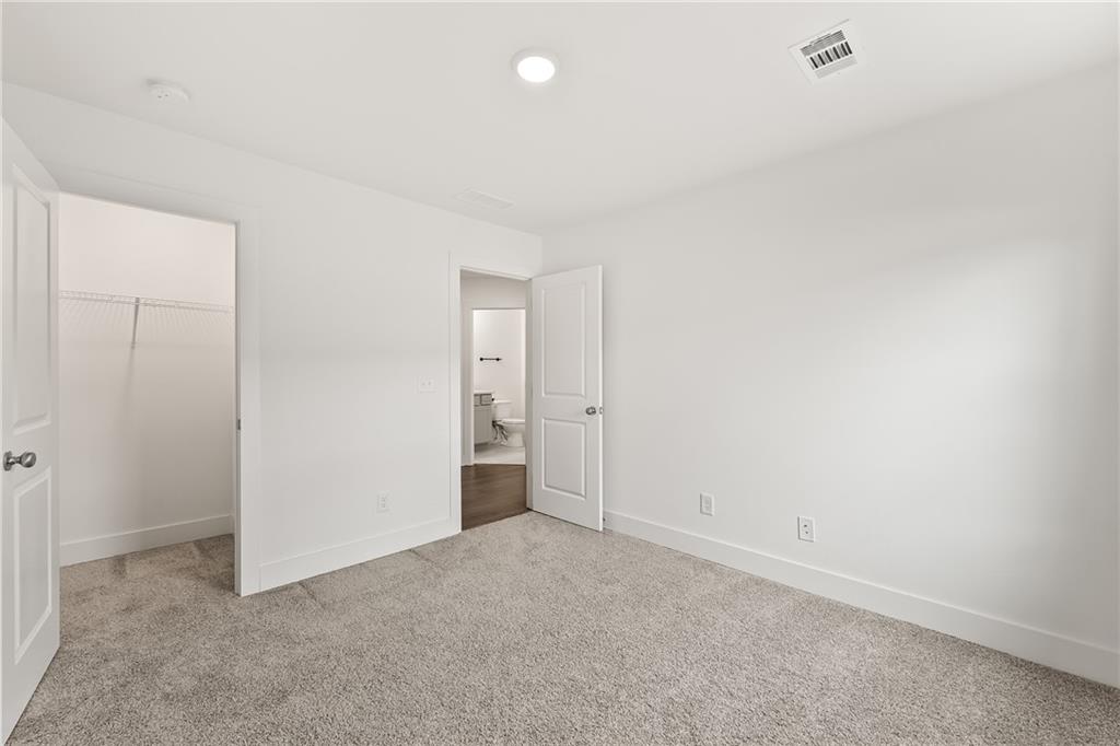98 Auburn Valley Way Auburn, GA 30011 - Photo 34 of 47 a view of an empty room