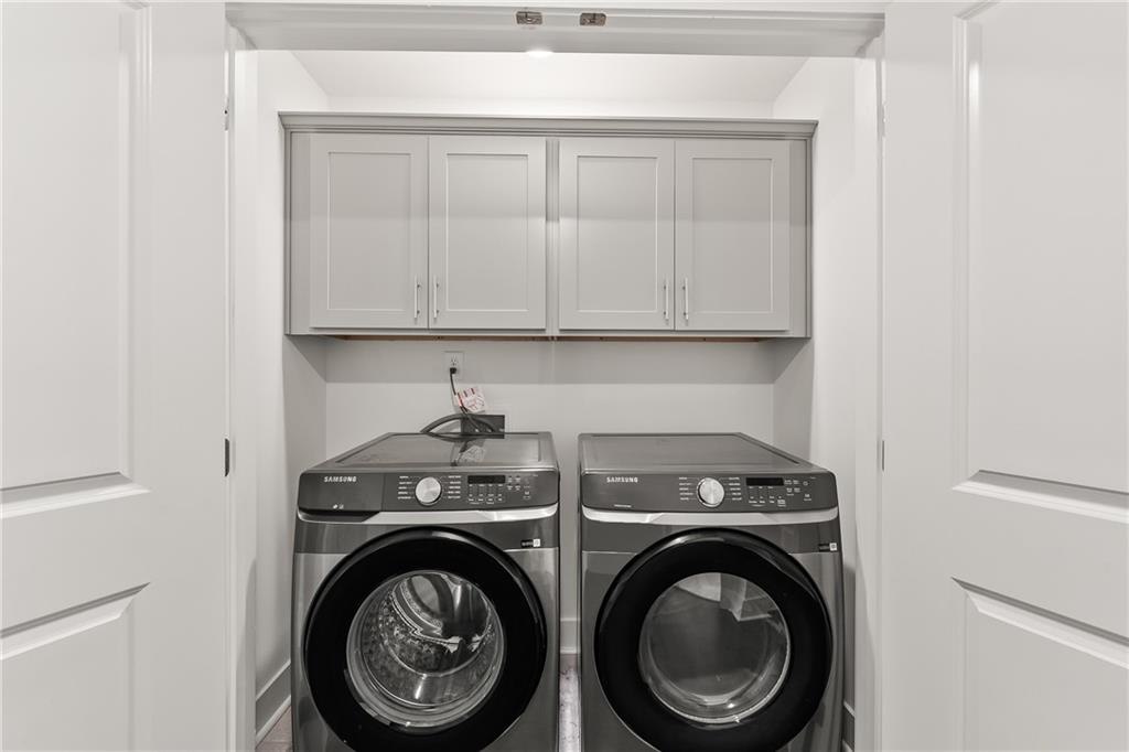98 Auburn Valley Way Auburn, GA 30011 - Photo 35 of 47 a utility room with dryer and washer