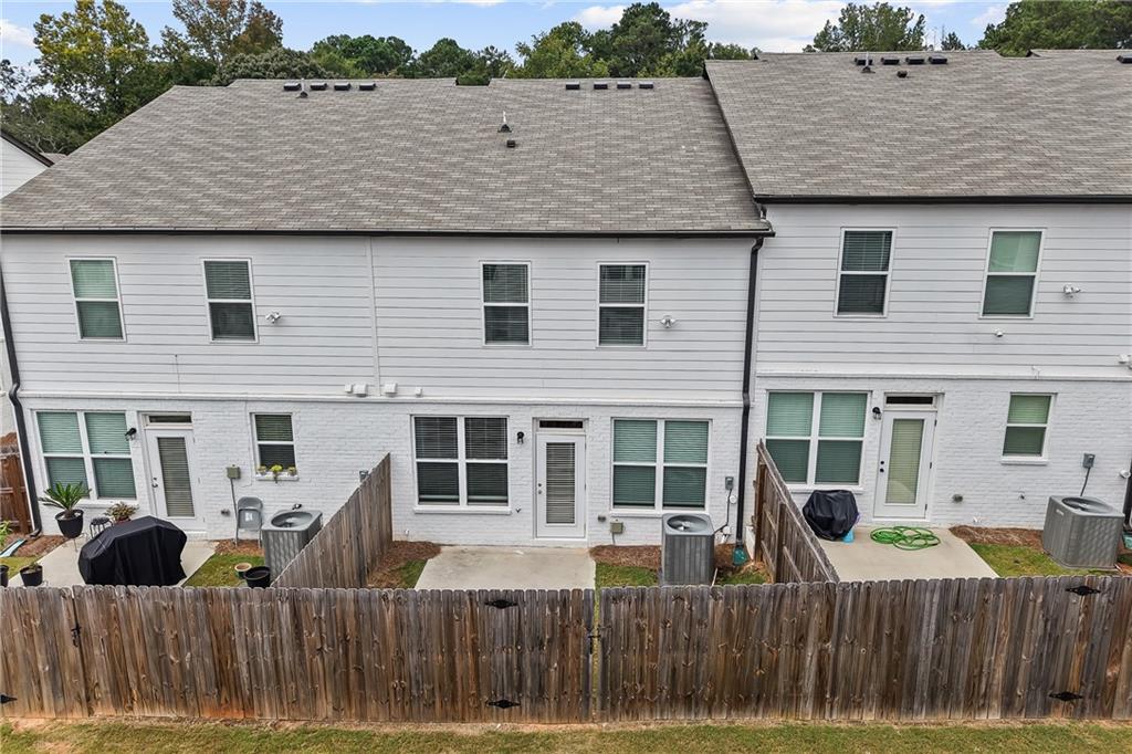 98 Auburn Valley Way Auburn, GA 30011 - Photo 38 of 47 a front view of a house with a porch