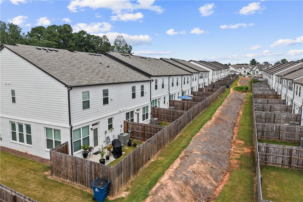 98 Auburn Valley Way Auburn, GA 30011 - Photo 39 of 47 a view of a house with wooden deck