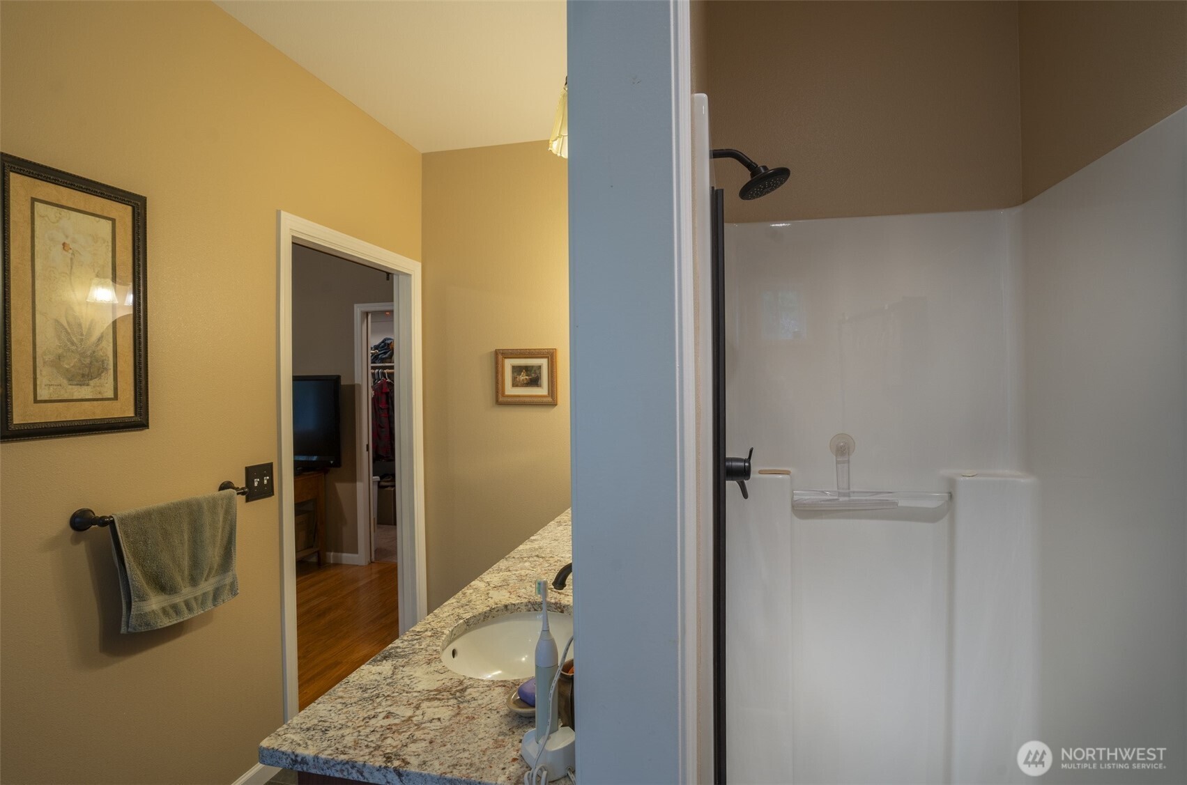 72 Doe Place Sequim, WA 98382 - Photo 16 of 40 a bathroom with a tub and shower