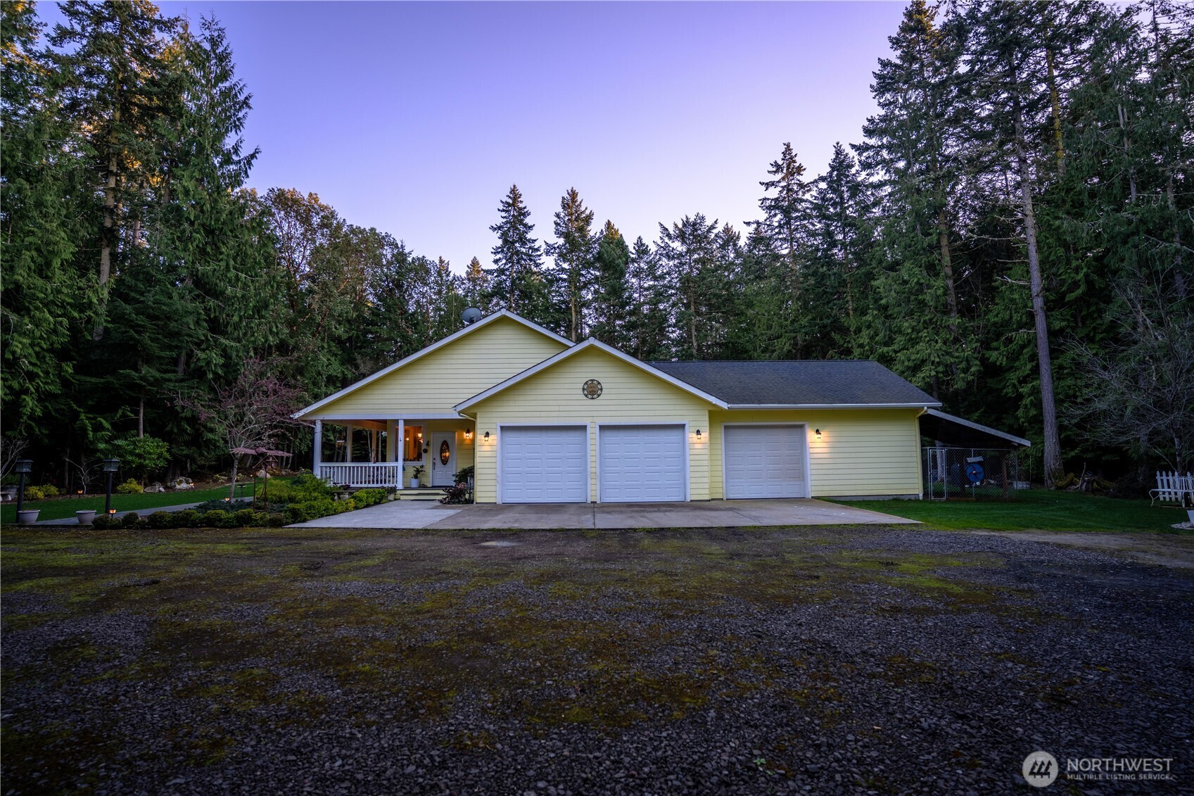 72 Doe Place Sequim, WA 98382 - Photo 2 of 40 a view of a house with yard and trees in the background