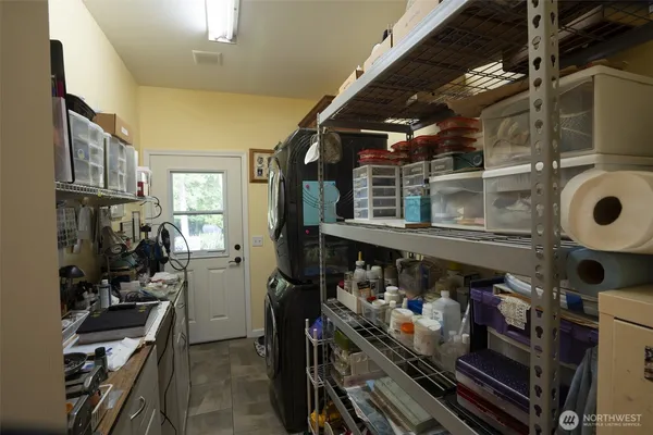 a kitchen with a stove and cabinets