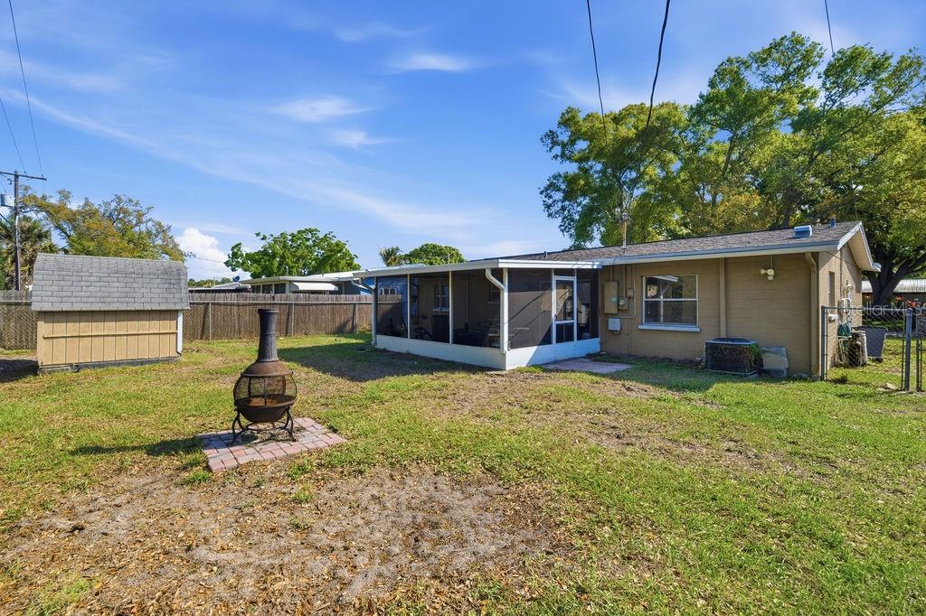 8520 109th Way North Seminole, FL 33772 - Photo 32 of 40 front view of a house with a yard