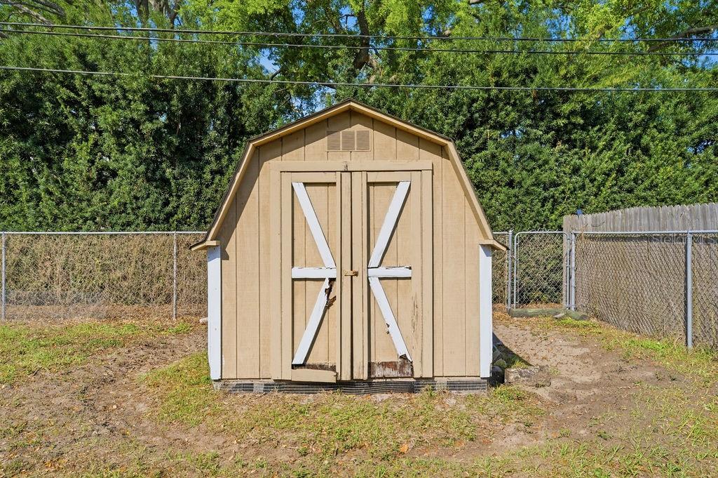 8520 109th Way North Seminole, FL 33772 - Photo 35 of 40 a view of a wooden fence