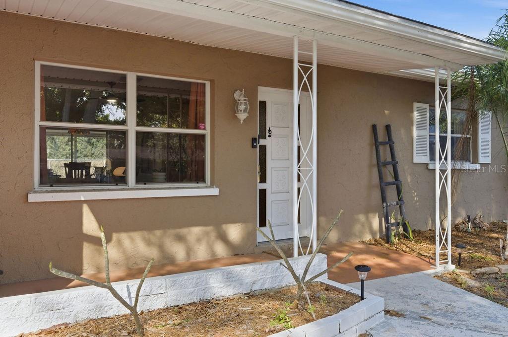 8520 109th Way North Seminole, FL 33772 - Photo 38 of 40 a living room with a couch