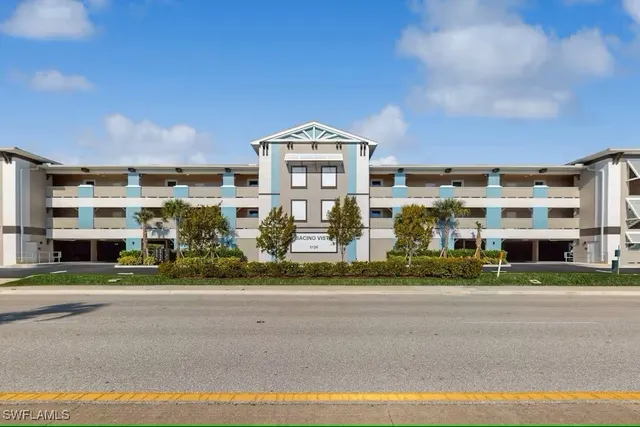 a front view of building with a street