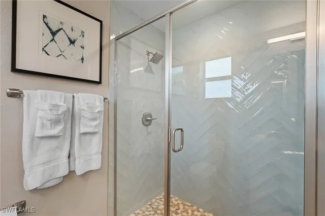 a bedroom with a bed and a cabinets