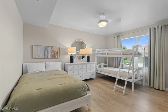 a bathroom with a granite countertop sink mirror and vanity