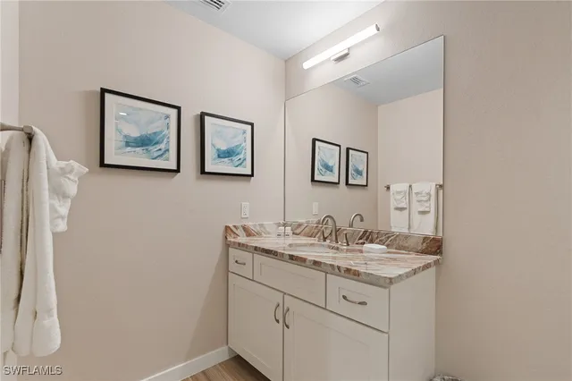 a bathroom with a shower and a toilet