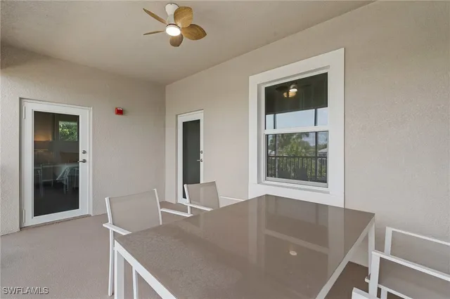 a view of an entryway with wooden floor