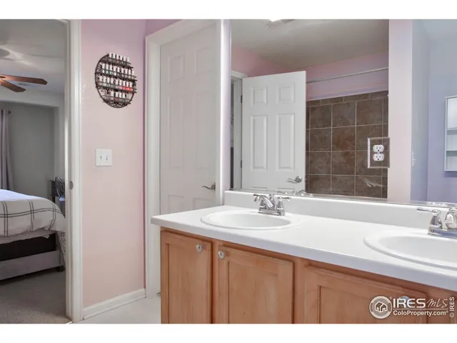 a bathroom with a sink a mirror and a bathtub