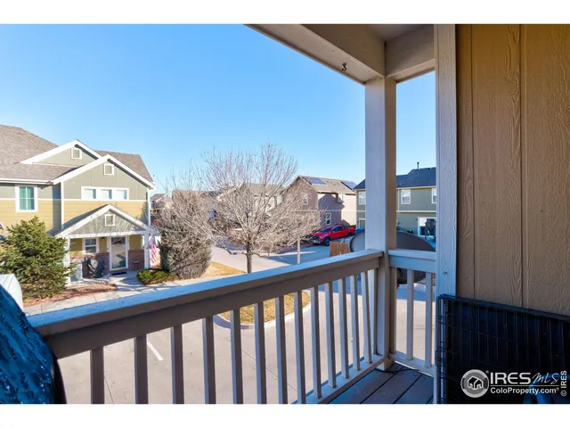 a view of a street from a balcony