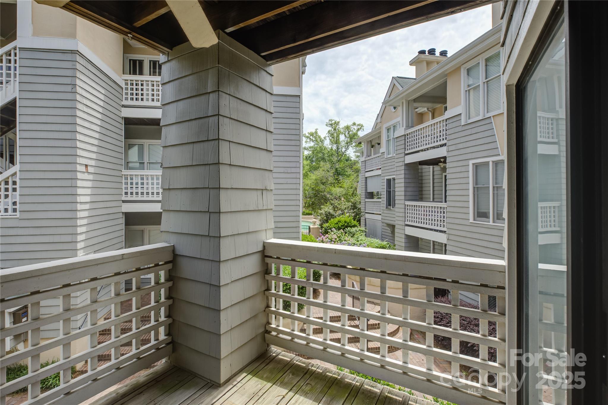 226 Queens Road, Unit 68 Charlotte, NC 28204 - Photo 16 of 40 a view of a balcony with door