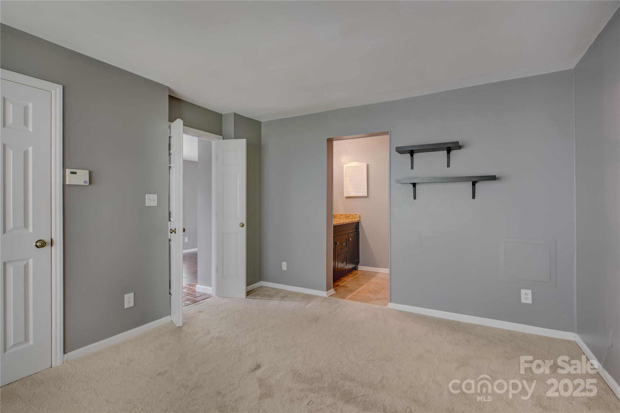 226 Queens Road, Unit 68 Charlotte, NC 28204 - Photo 23 of 40 a view of a room with an empty space