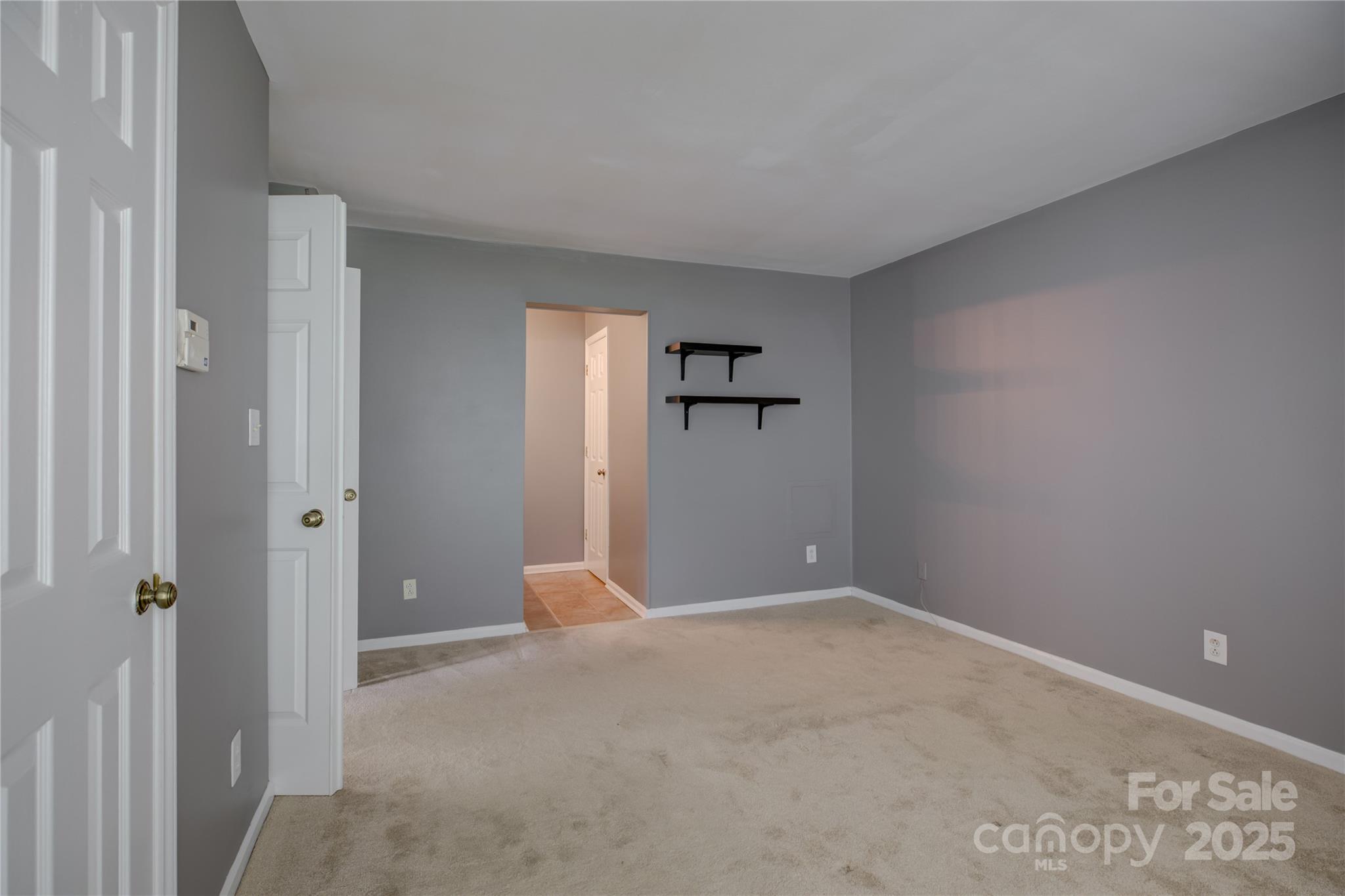 226 Queens Road, Unit 68 Charlotte, NC 28204 - Photo 24 of 40 a view of an empty room