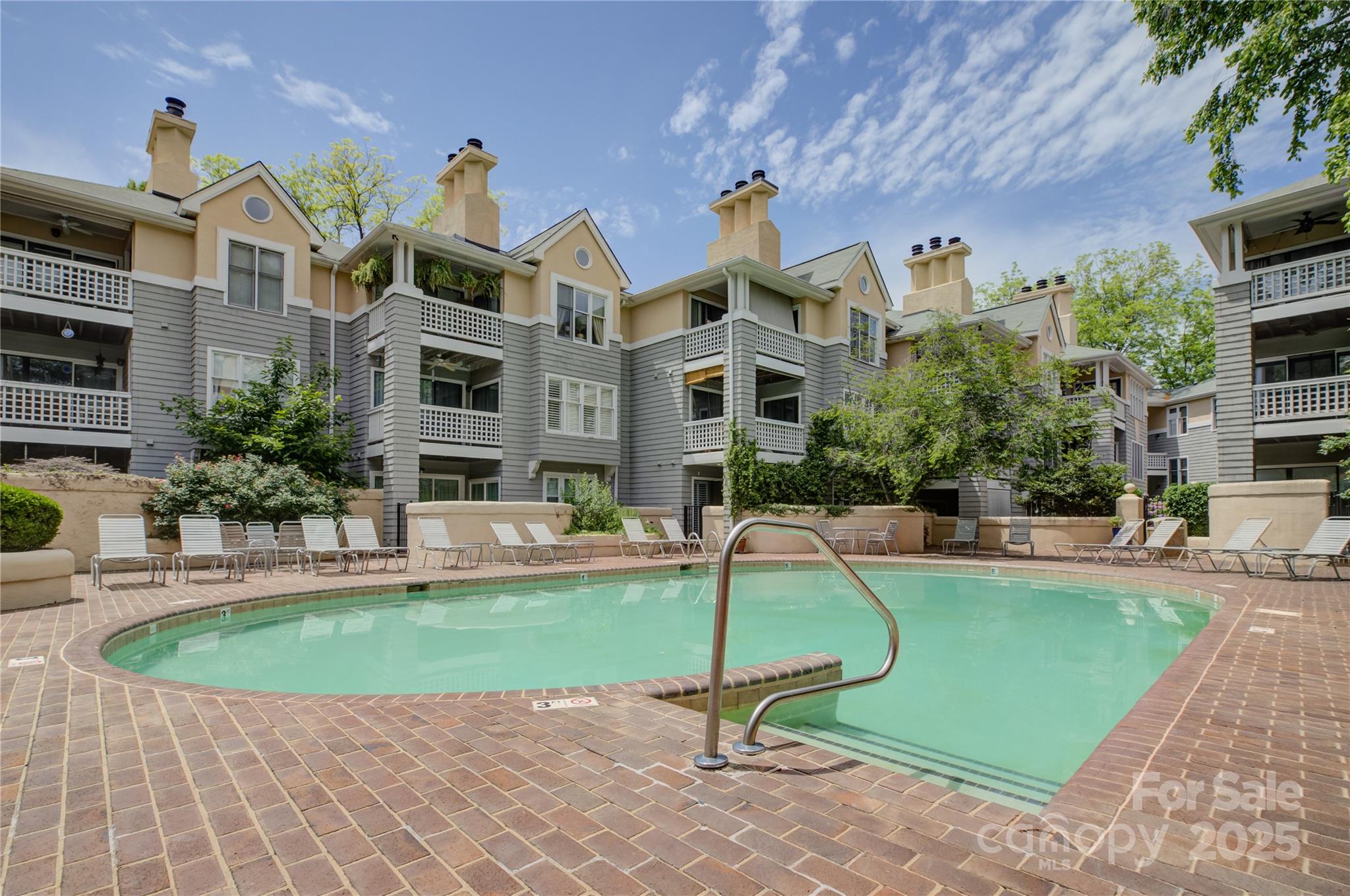 226 Queens Road, Unit 68 Charlotte, NC 28204 - Photo 37 of 40 a view of a house with a swimming pool