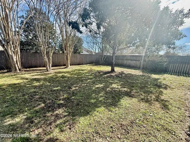 a house with trees in front of it