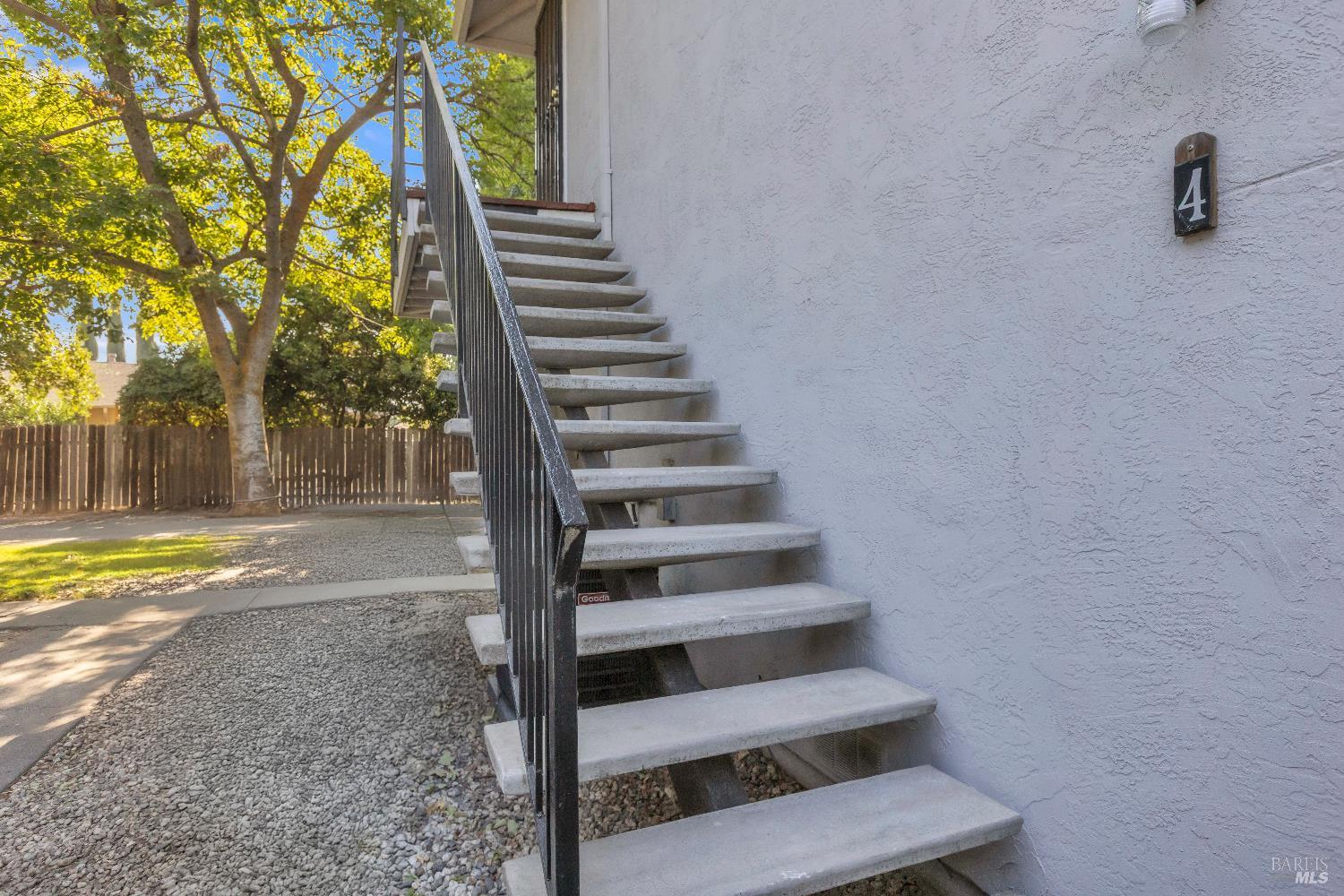 128 Del Rio Court, Unit 4 Vacaville, CA 95687 - Photo 2 of 23 a view of entryway and hall with wooden floor