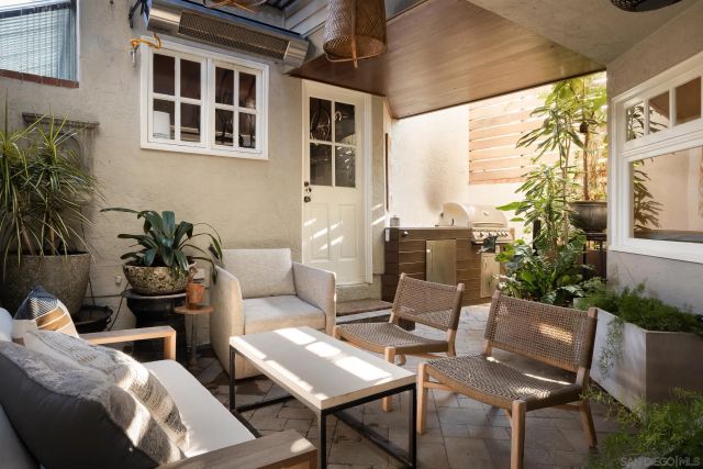 a building outdoor space with patio furniture