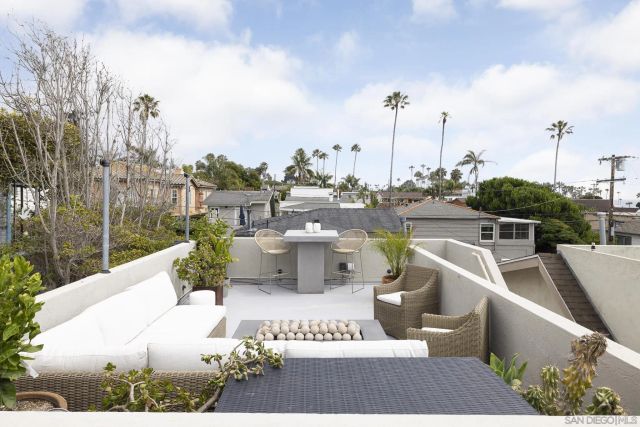 a view of a terrace with furniture