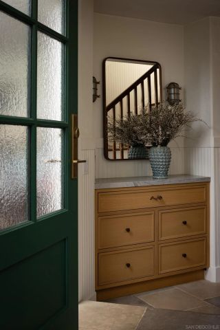 a bathroom with a sink and vanity