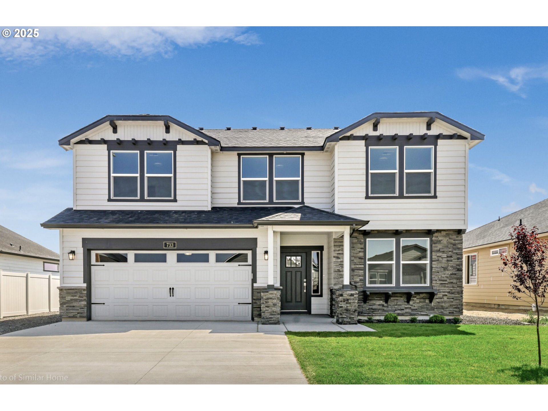 5205 Cedar View Drive Springfield, OR 97478 - Photo 1 of 1 a front view of a house with a yard and garage