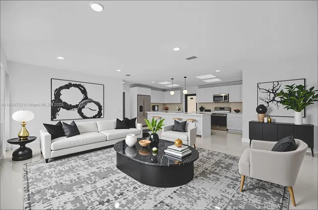 a living room with furniture and a rug