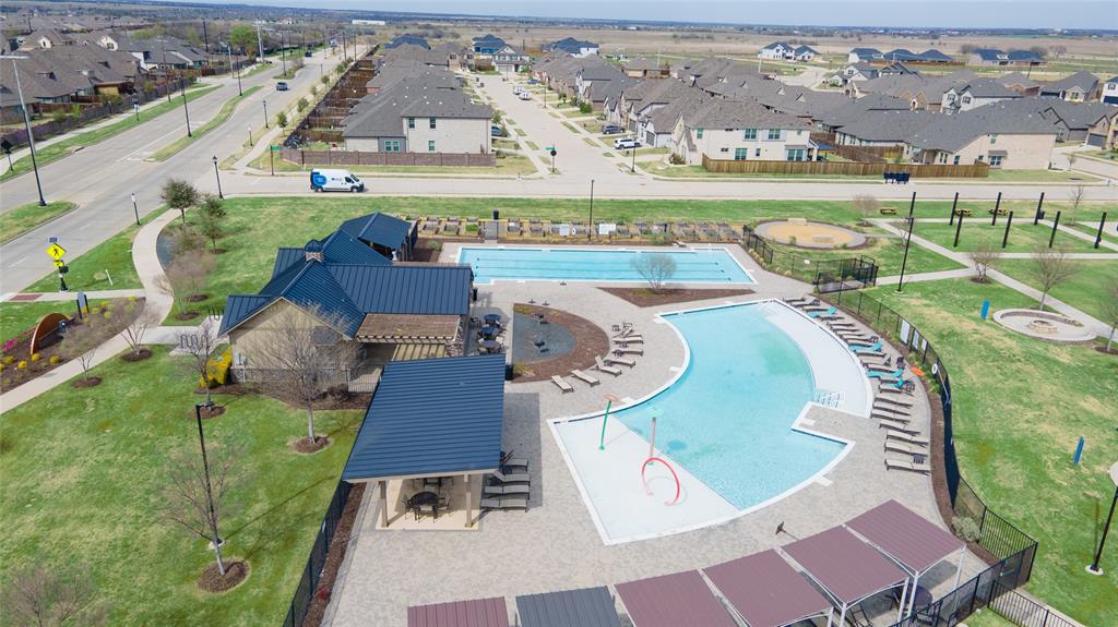 4542 Kipling Avenue Aubrey, TX 76227 - Photo 33 of 34 an aerial view of a house with a garden and pool