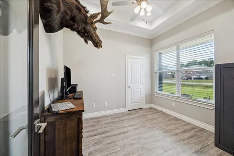 a living room with fireplace furniture and a flat screen tv