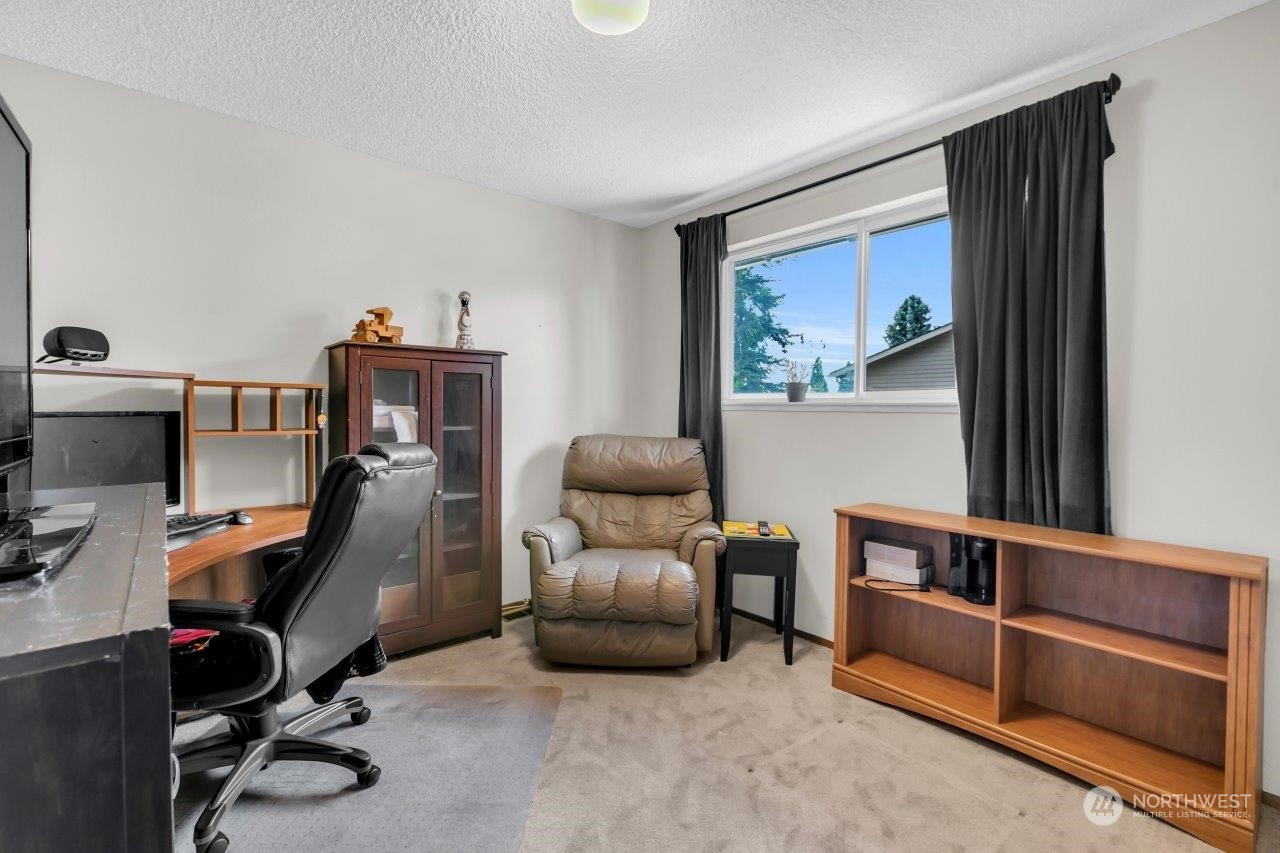 17043 159th Place Southeast Renton, WA 98058 - Photo 17 of 30 a view of a workspace with furniture and a window