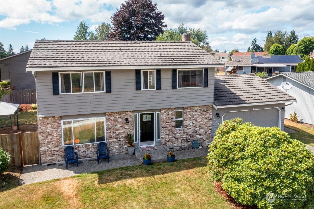 17043 159th Place Southeast Renton, WA 98058 - Photo 27 of 30 a view of a house with a yard and sitting area