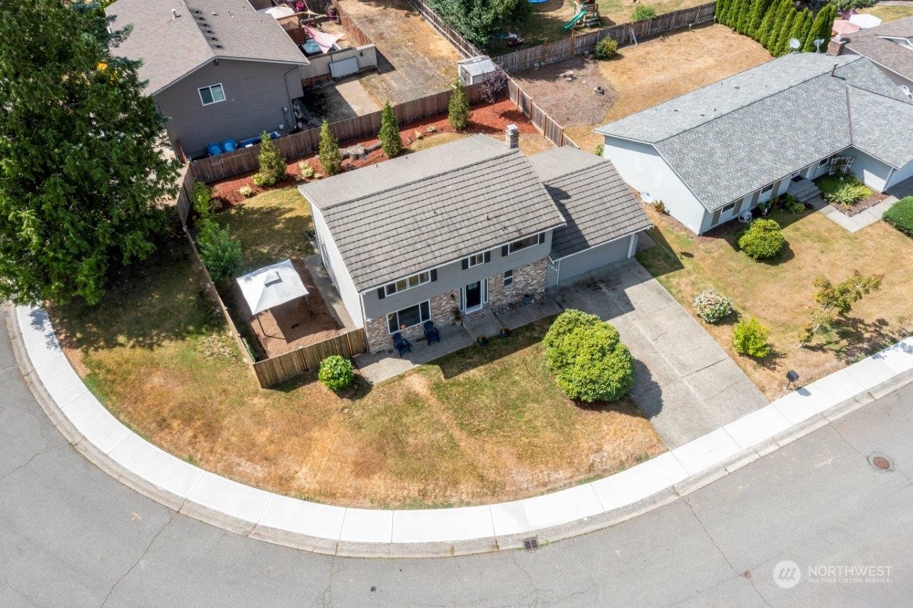17043 159th Place Southeast Renton, WA 98058 - Photo 3 of 30 an aerial view of a house with swimming pool and porch