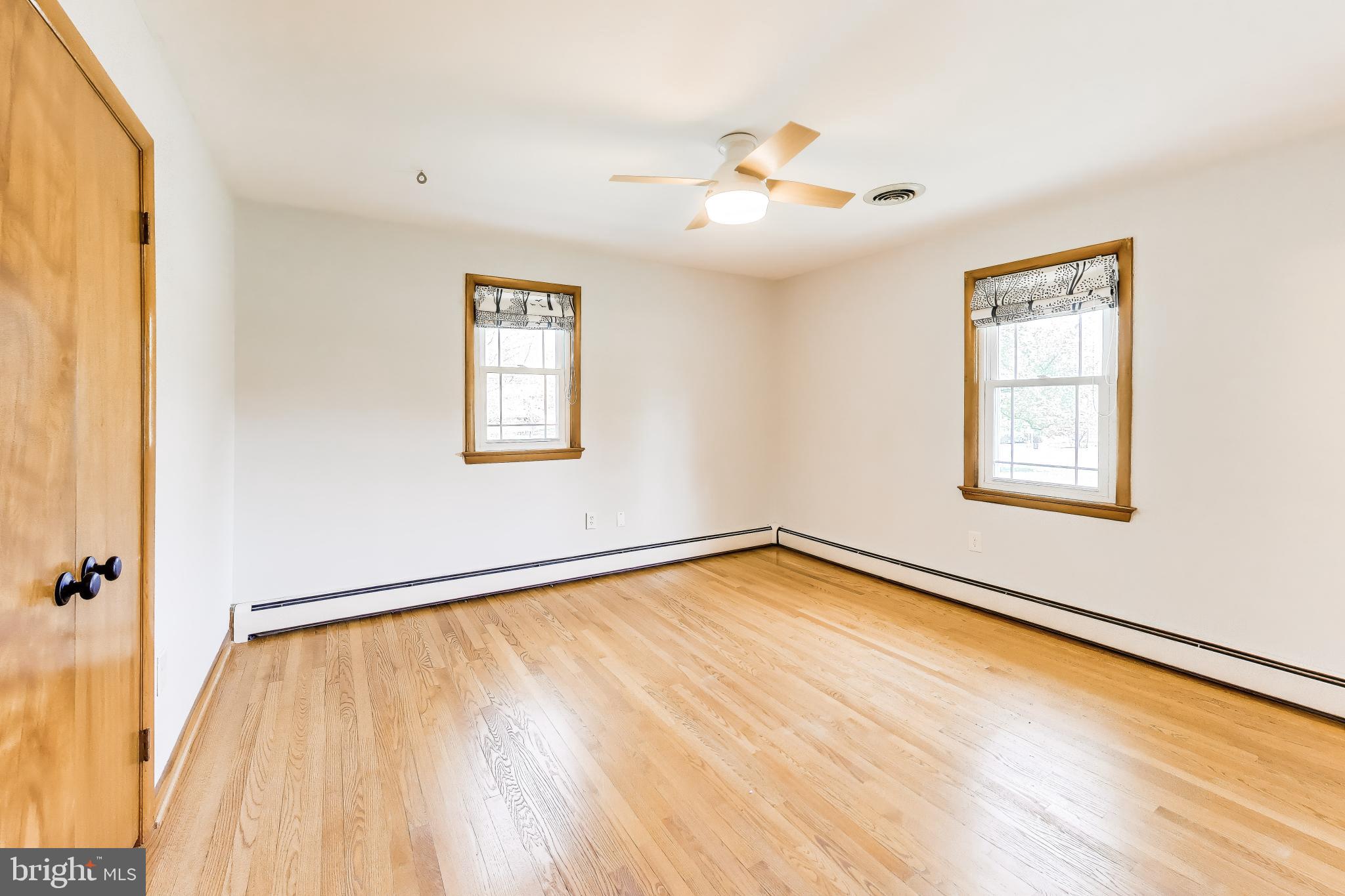3904 Overlook Lane Monrovia, MD 21770 - Photo 18 of 54 a view of a room with wooden floor and chandelier