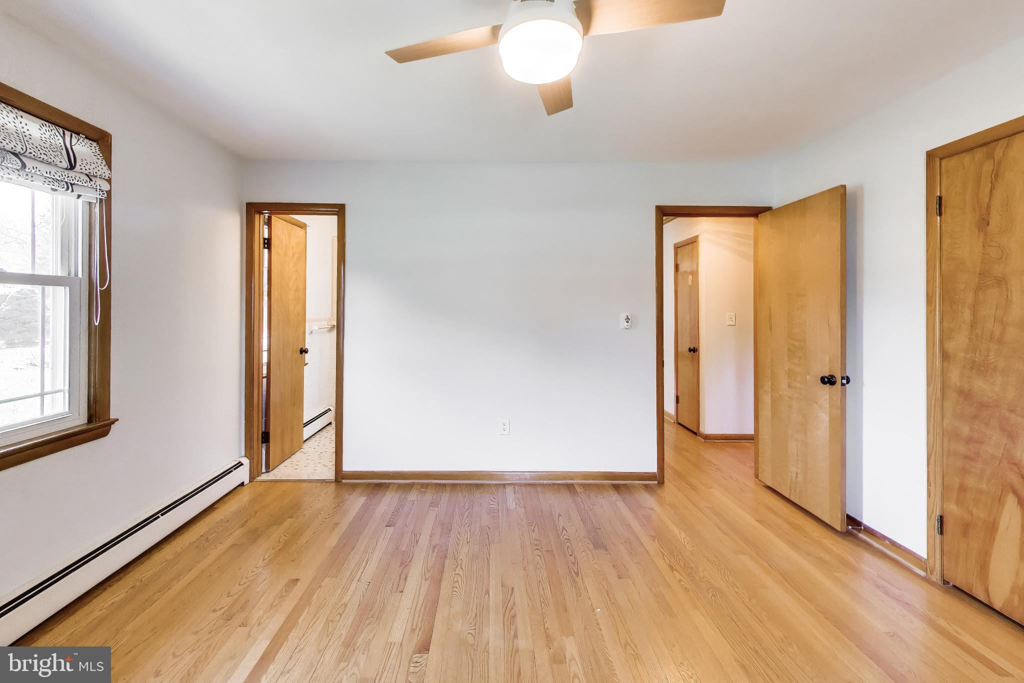 3904 Overlook Lane Monrovia, MD 21770 - Photo 20 of 54 wooden floor in an empty room with a window