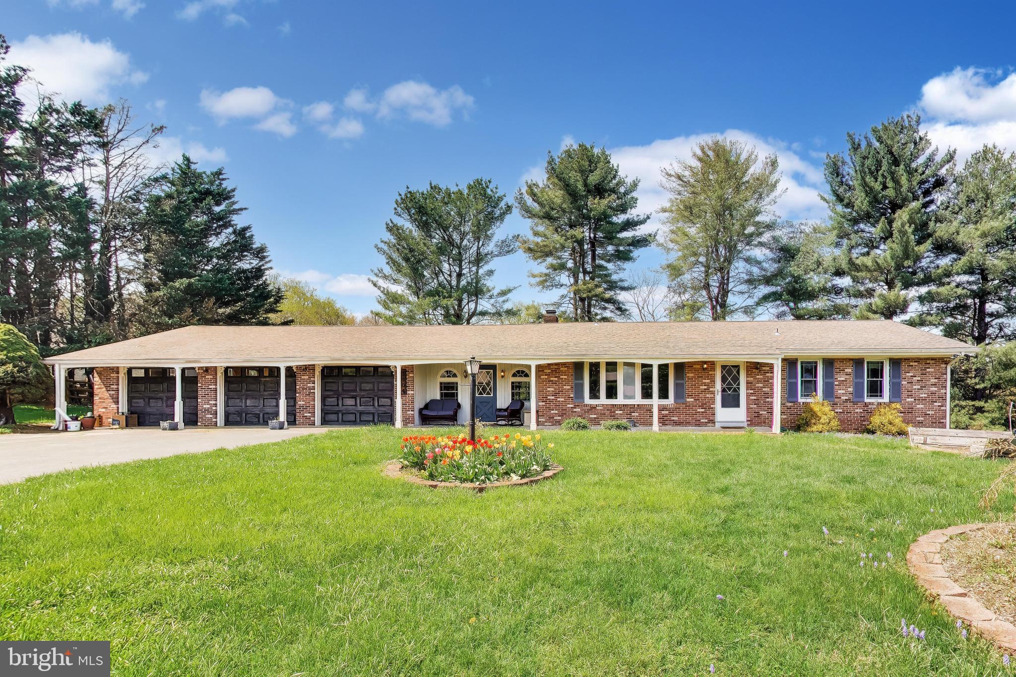 3904 Overlook Lane Monrovia, MD 21770 - Photo 2 of 54 a view of a house with a backyard and a patio