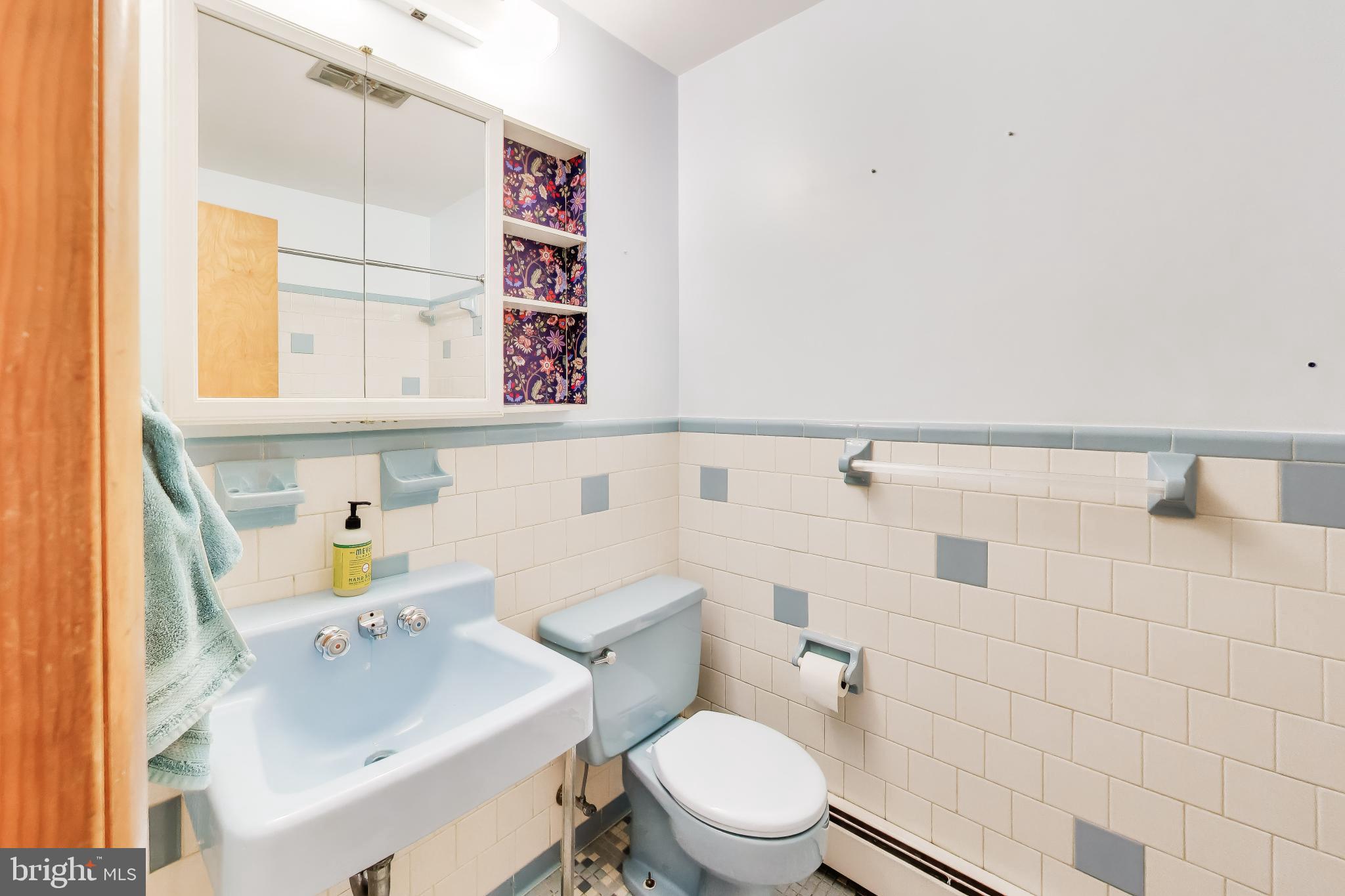 3904 Overlook Lane Monrovia, MD 21770 - Photo 28 of 54 a white toilet sitting next to a bathroom sink
