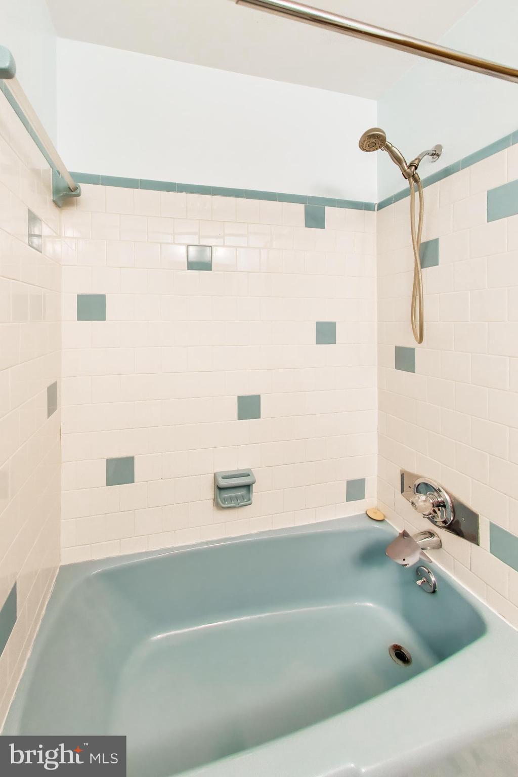 3904 Overlook Lane Monrovia, MD 21770 - Photo 29 of 54 a bathroom with a bathtub and shower