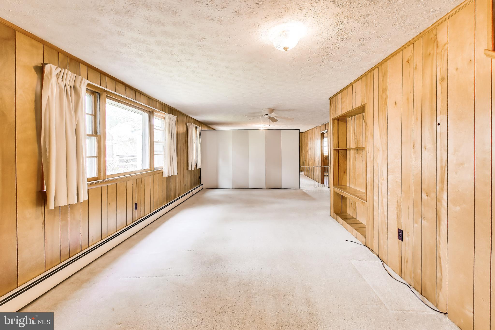 3904 Overlook Lane Monrovia, MD 21770 - Photo 33 of 54 a view of an empty room and wooden floor