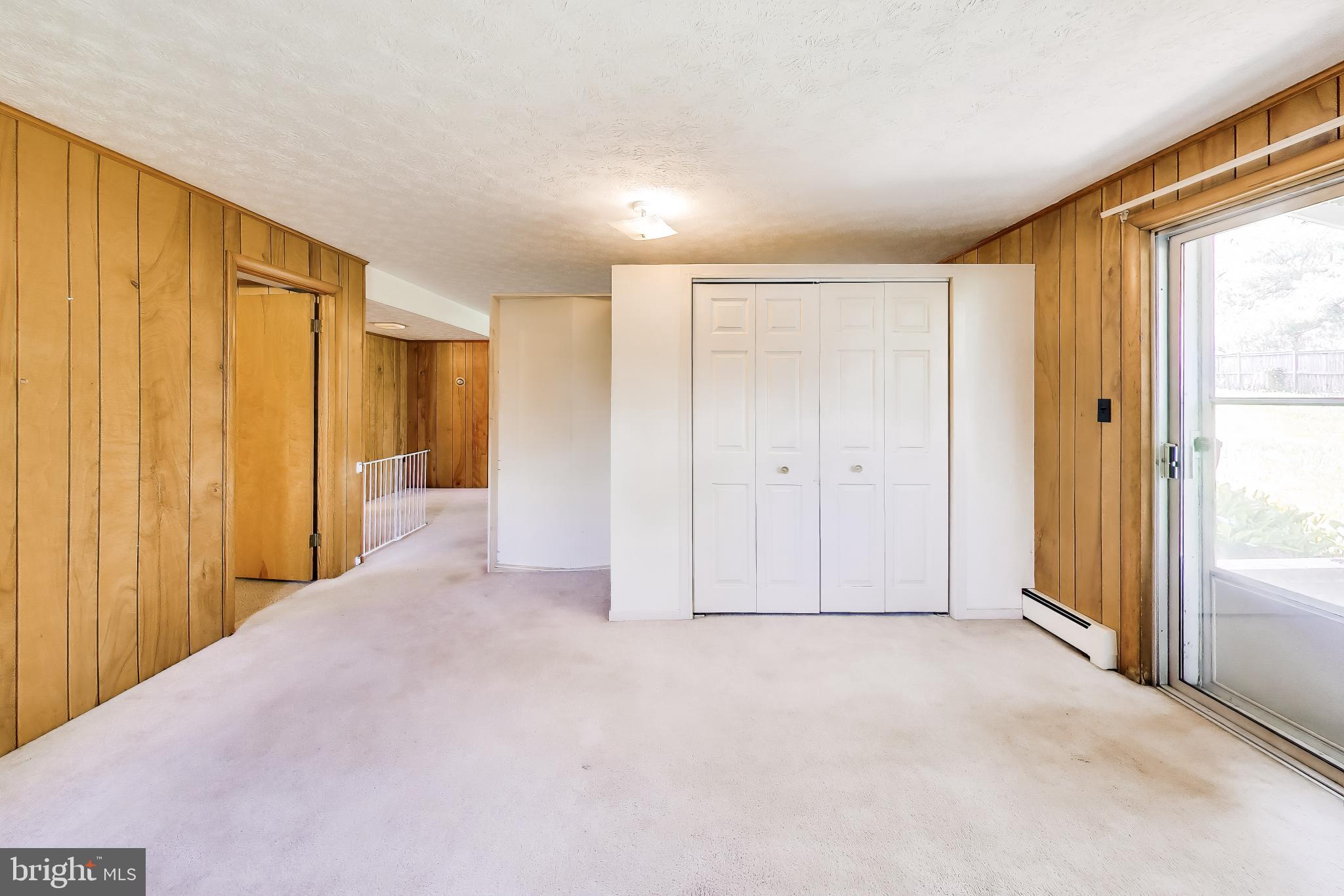 3904 Overlook Lane Monrovia, MD 21770 - Photo 35 of 54 a view of empty room with wooden walls