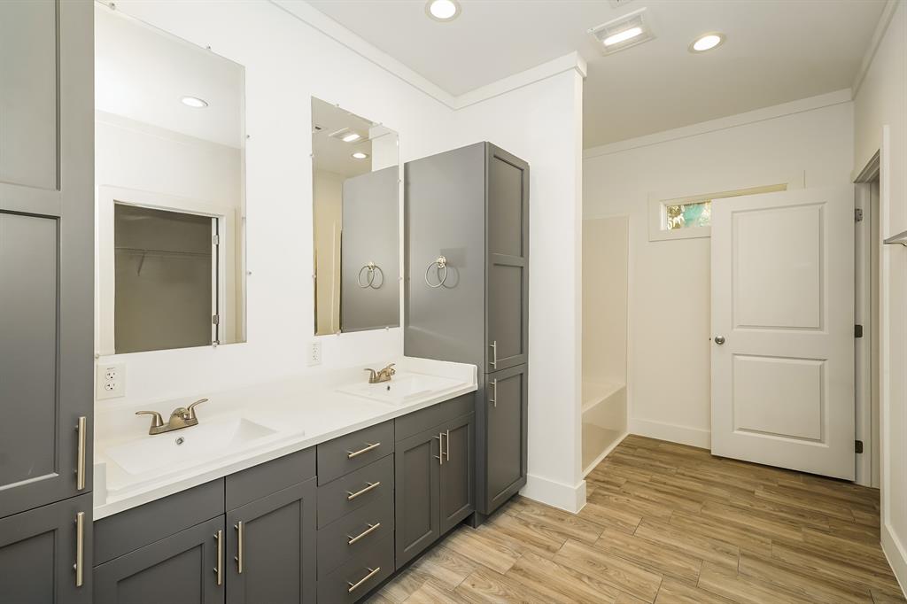 2003 East Overton Road Dallas, TX 75216 - Photo 11 of 16 a bathroom with a sink and a mirror