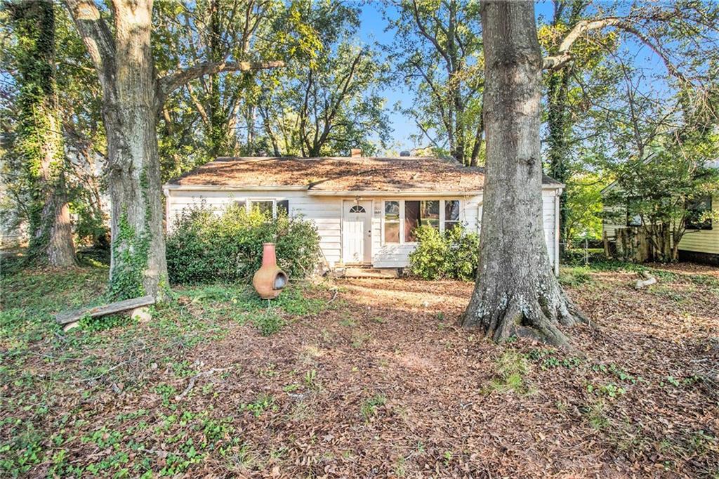 3601 Orchard Circle Decatur, GA 30032 - Photo 1 of 1 a view of a house with backyard and trees