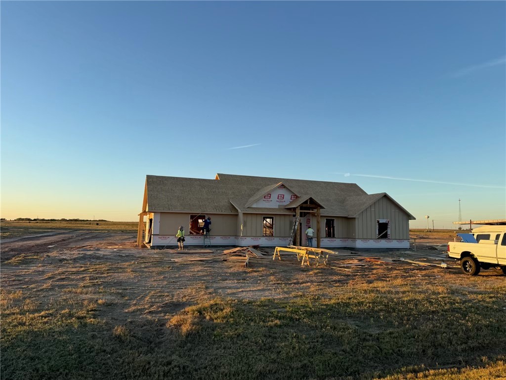 a front view of a house with a ocean view