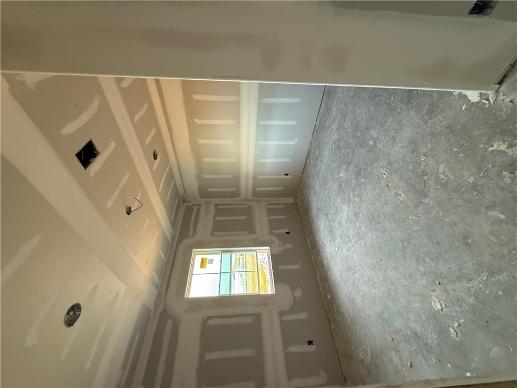 6423 Scenic View Trail Bryan, TX 77808 - Photo 19 of 43 an empty room with a empty space and windows