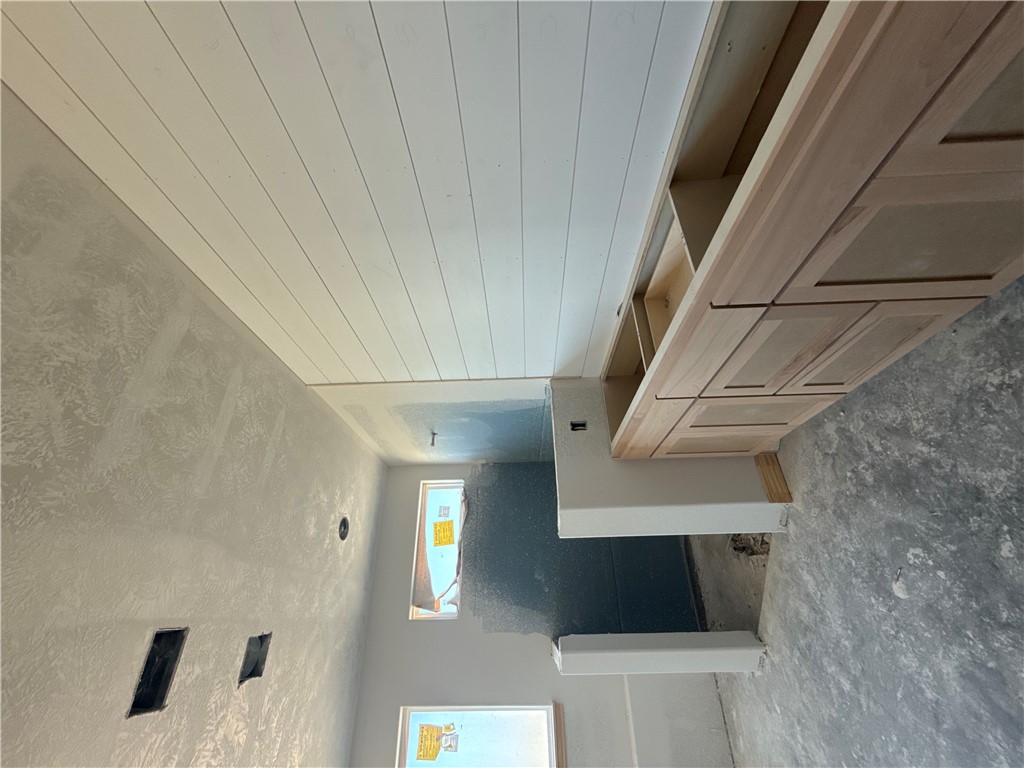 6423 Scenic View Trail Bryan, TX 77808 - Photo 35 of 43 a utility room with cabinets