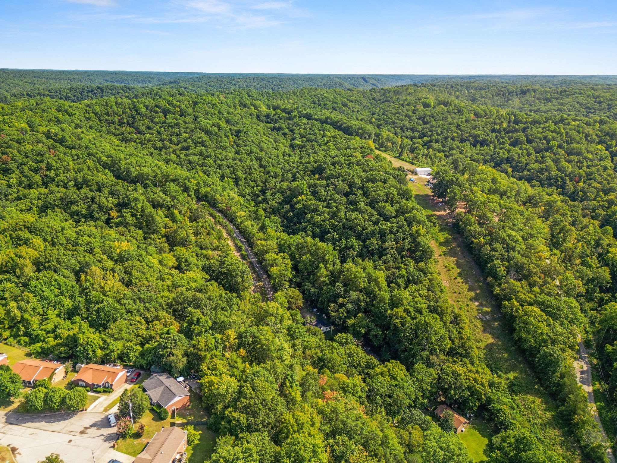 1046 Cemetery Road Ashland City, TN 37015 - Photo 11 of 15 an aerial view of residential houses with outdoor space and trees
