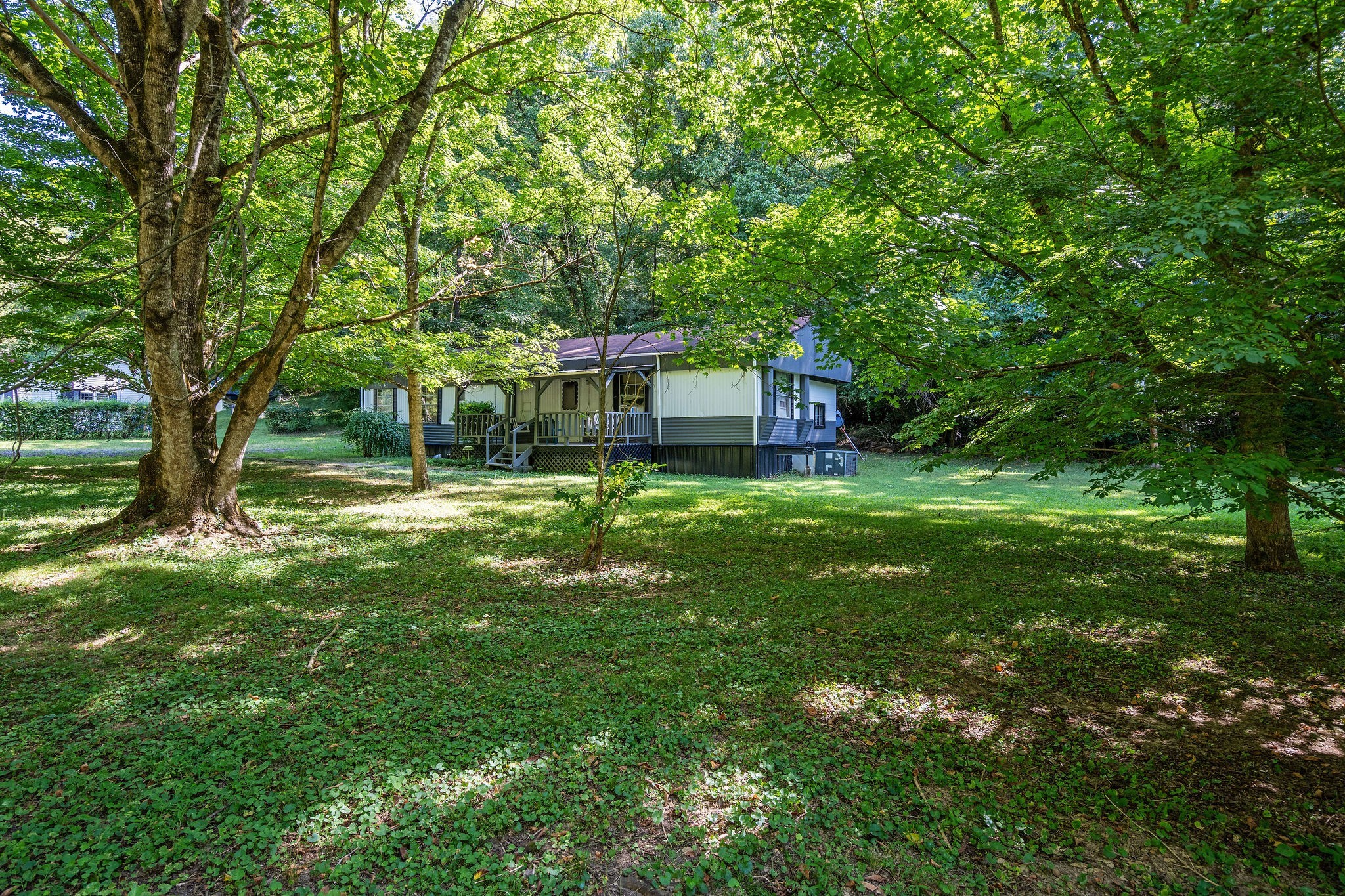 1046 Cemetery Road Ashland City, TN 37015 - Photo 15 of 15 a view of a house with a big yard