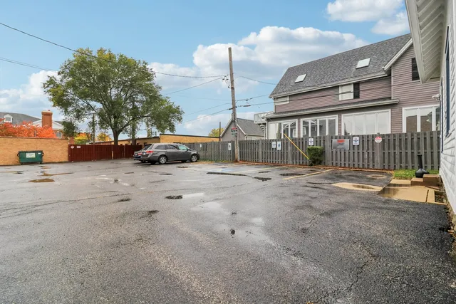 a view of street with parked cars